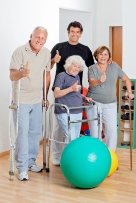 Physical therapy staff with patients.